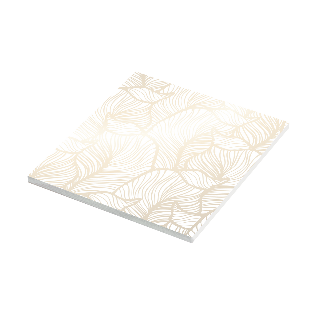 A white photo notepad with gold leaves on it, made of FSC-certified paper by Fuji Personalized Photo Products.