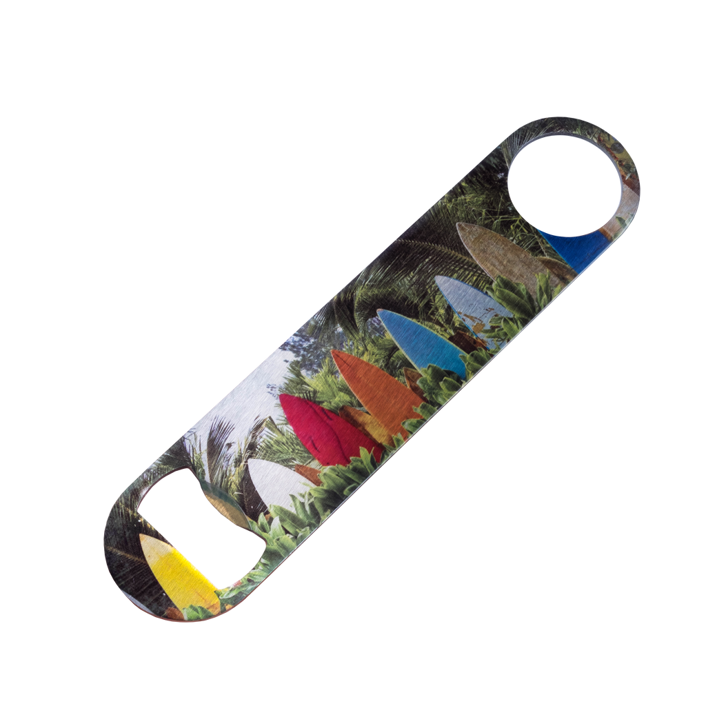 A cutout of a large Fuji Personalized Photo Products Custom Photo Bottle Opener overlaid with a custom photo of a tropical beach scene.