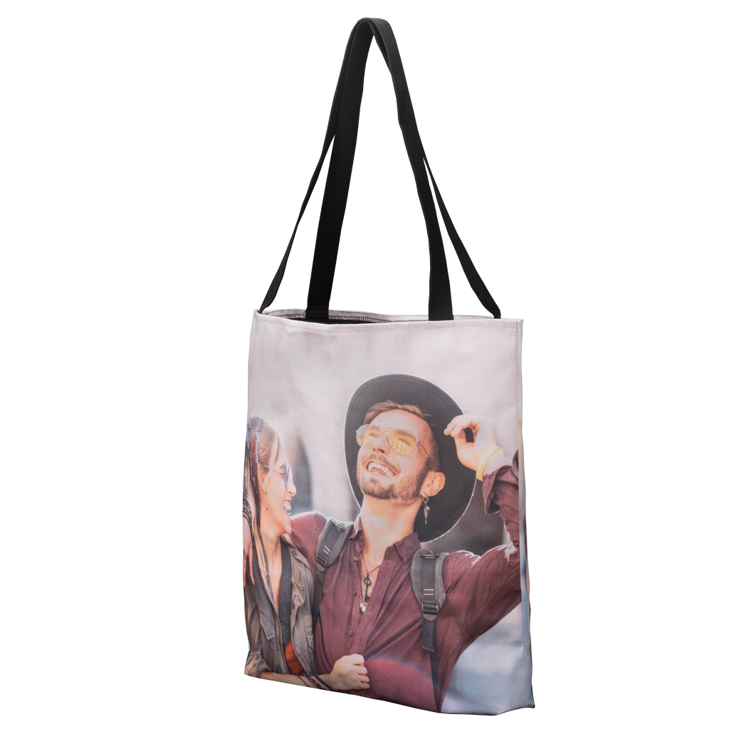 A tote bag with an image of a man and a woman.