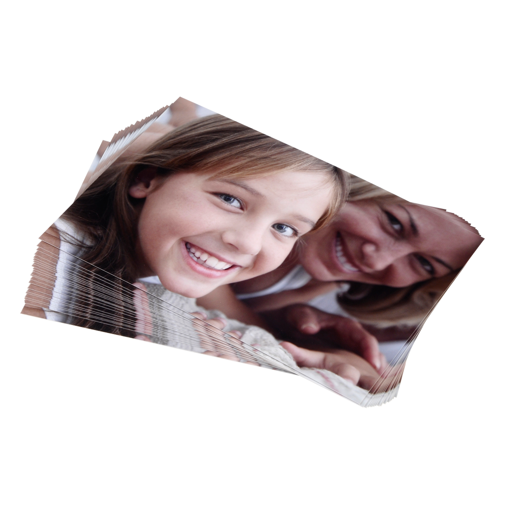 A photo of a woman and a child, printed in varying sizes on Fuji Personalized Photo Products Small Format Prints.