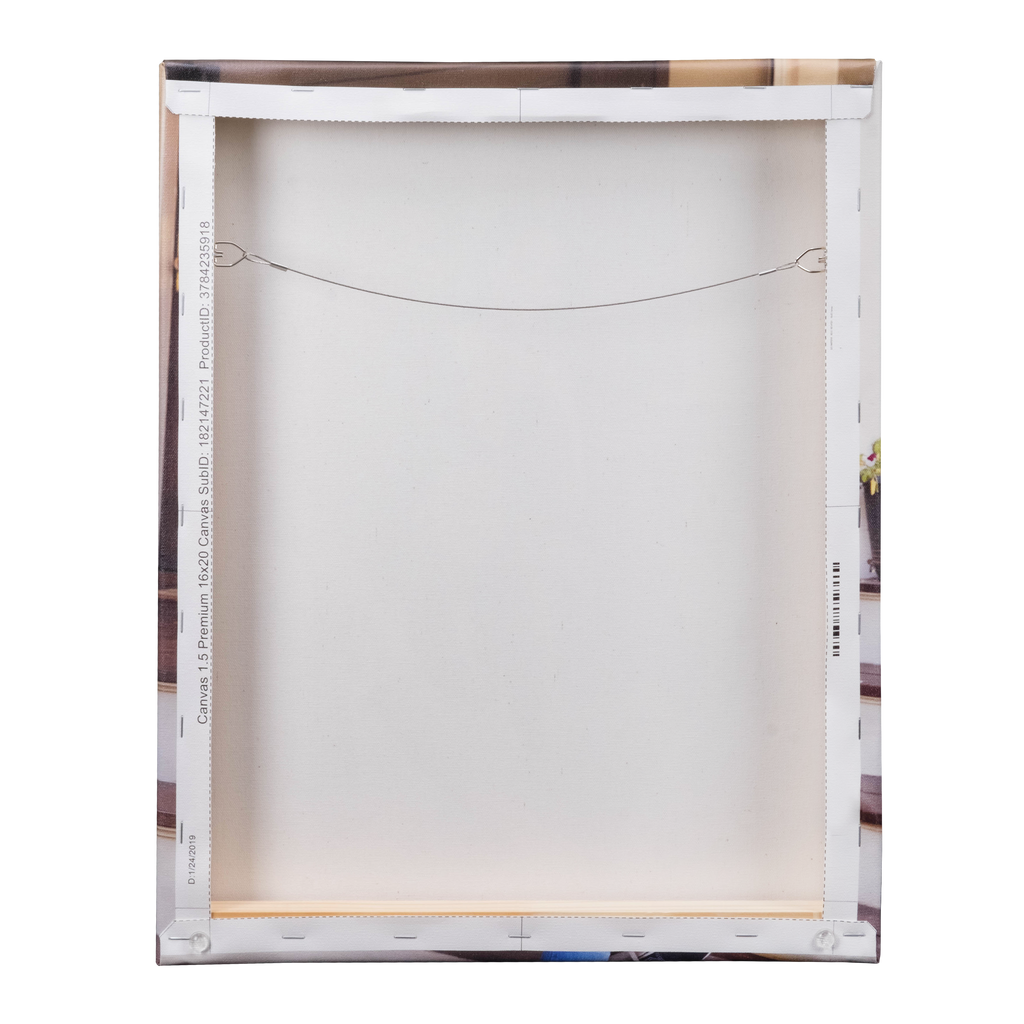 Rear view of a stretched, Fuji Personalized Photo Products canvas photo print showing the wooden frame and hanging wire.