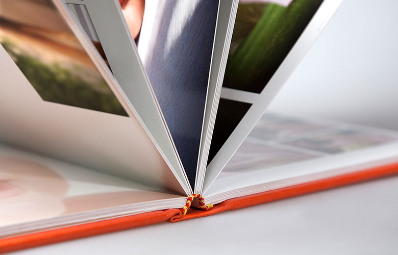 A photo book with several photos on it.