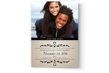 A custom printed save the date card with a photo of a couple from Photo Book Press' Save the Date Card Printing.