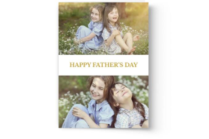 Two young girls smiling and embracing outdoors with a Photo Book Press Create & Print Custom Photo Father's Day Card greeting.