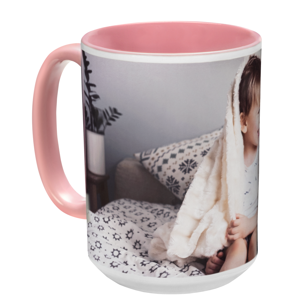 A pink Colorful Ceramic Photo Mug from Fuji Personalized Photo Products with a photo of a child on it.