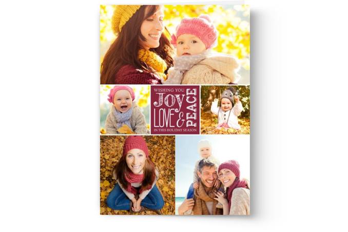 A Photo Book Press Custom Photo Christmas Card Printing collage of family photos with autumn leaves in the background, featuring a smiling mother and child, a baby, and a happy couple, with a personalized Christmas card message of "joy.