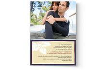 A Photo Book Press wedding invitation with a photo of a couple hugging, available in custom printed template designs.