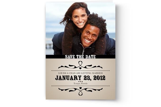 A custom printed Save the Date Card Printing with an image of a couple from Photo Book Press.